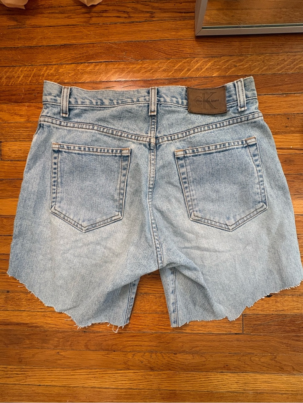 Calvin Klein Light Blue High-Rise Cutoff Denim Shorts